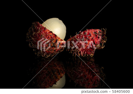 Fresh red rambutan isolated on black glass 58405600