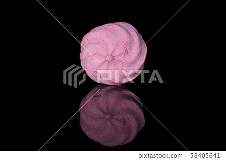 Fresh pastel sweet zefir isolated on black glass Fresh pastel sweet zefir isolated on black glass 58405641
