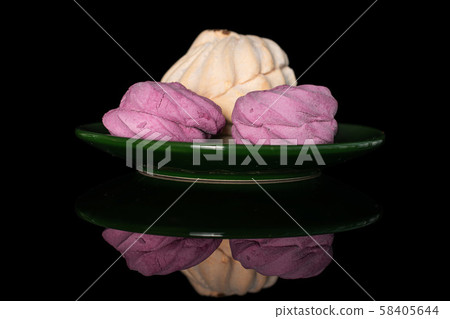 Fresh pastel sweet zefir isolated on black glass 58405644