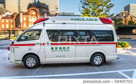 Tokyo cityscape in Japan Ambulance leaving Tokyo station Marunouchi square in front of Tokyo station 58405701