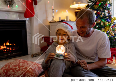Family at home at Christmas time 58409644
