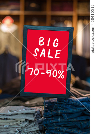 Big sale 70-90 off mock up advertise display frame setting over the bucket jeans in the shopping department store for shopping, business fashion and advertisement concept Big sale 70-90 off mock up advertise display frame setting over the bucket jeans in the shopping department store for shopping, business fashion and advertisement concept 58410513