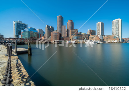 Boston skyline from Fan Pier at the afternoon with smooth water river, Massachusetts, USA downtown skyline, United state of America, Architecture and building with tourist concept 58410822