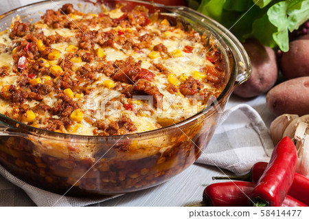 Mexican potato casserole with minced meat 58414477