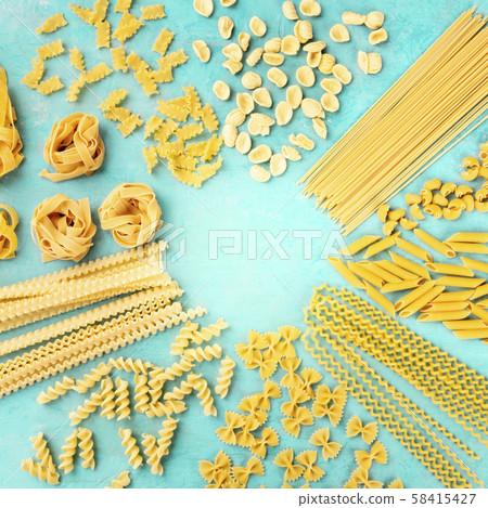 Italian pasta, flat lay square banner with a place for text, shot from the top on a teal blue 58415427