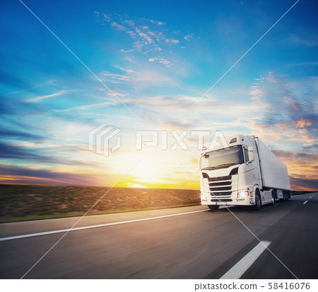 European truck vehicle with dramatic sunset light 58416076