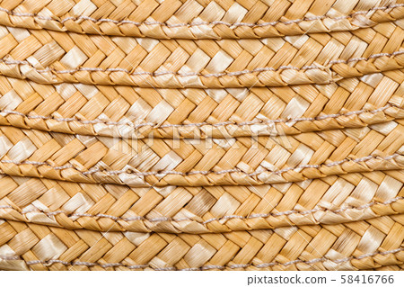 detail of stitched summer straw hat from raffia detail of stitched summer straw hat from raffia 58416766