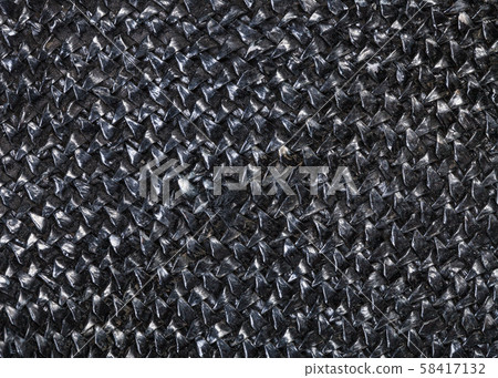 detail of straw hat from black toyo fibers detail of straw hat from black toyo fibers 58417132