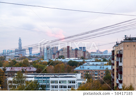 blue sunset sky over residential district in city 58417185