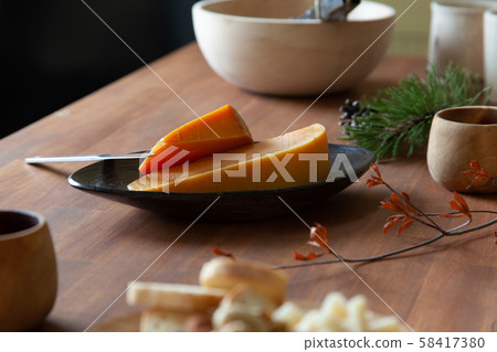In the morning, cheese on the table by the window 58417380