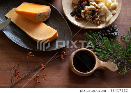 While drinking wine at Kukusa. Cheese and snacks. Table photo from above While drinking wine at Kukusa. Cheese and snacks. Table photo from above 58417382