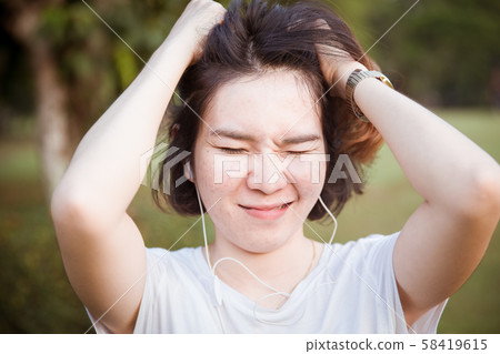 Girl teen Scratch her head Irritated and annoyed 58419615