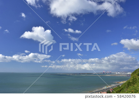 Coastline landscape with blue sky and white clouds 58420076