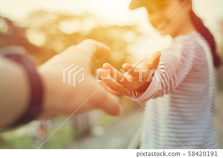 Girl teen smiling and reach her hand. Help Touch 58420191