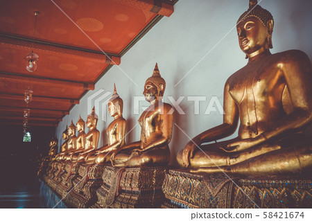Buddha statues in Wat Pho, Bangkok, Thailand 58421674