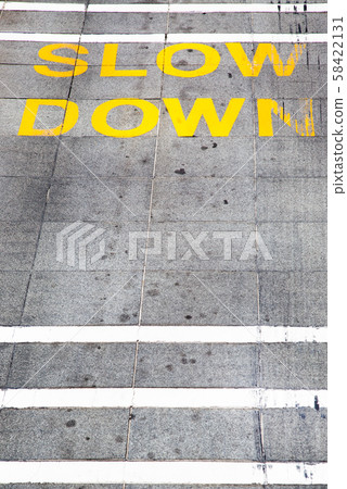 slow down sign on a road - mindfulness slow down sign on a road - mindfulness 58422131