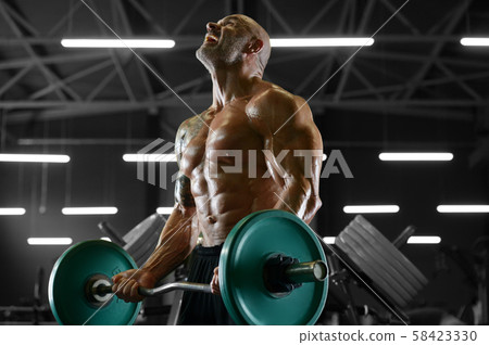 Handsome strong athletic men pumping up biceps Handsome strong athletic men pumping up biceps 58423330