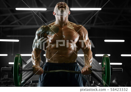 Handsome strong athletic men pumping up biceps Handsome strong athletic men pumping up biceps 58423332