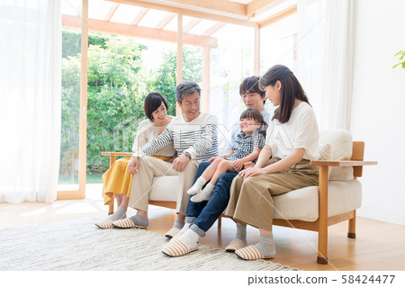 Three generations family, living, home 58424477