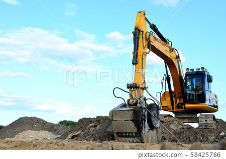 Excavator with crusher bucket for crushing concrete 58425786