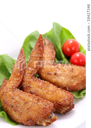 Chicken wings dish white background Chicken wings dish white background 58427346