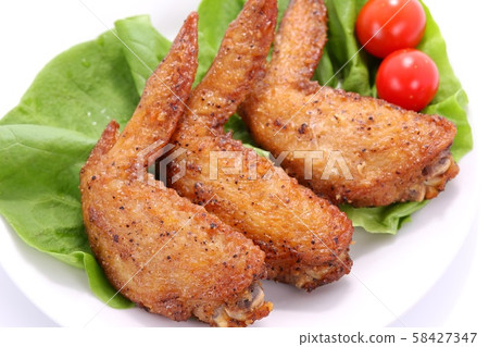 Chicken wings dish white background Chicken wings dish white background 58427347