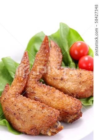 Chicken wings dish white background Chicken wings dish white background 58427348