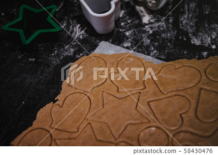 cut out gingerbread cookie in the form of a cut out gingerbread cookie in the form of a 58430476
