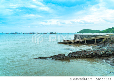 A large fishing boat stranded A large fishing boat stranded 58434453