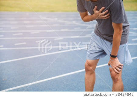 Man runner athlete chest injury and pain. Man Man runner athlete chest injury and pain. Man 58434845