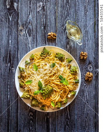Roasted romanesco and cauliflower pasta. Top view. 58435541