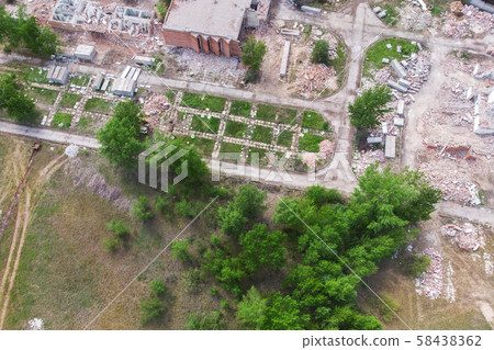 Aerial drone view of old demolished industrial building. Pile of concrete and brick rubbish, debris 58438362