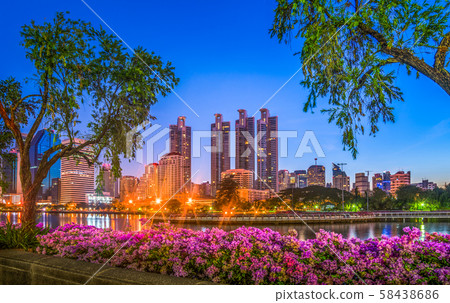 Lake in City Park under Skyscrapers at Night Lake in City Park under Skyscrapers at Night 58438686
