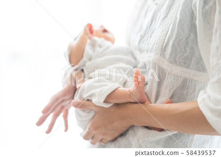 Newborn (0 years and 0 months) and mother Newborn (0 years and 0 months) and mother 58439537