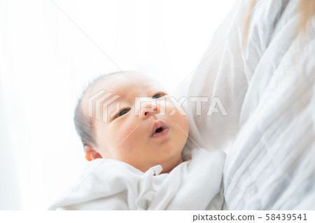 Newborn (0 years and 0 months) and mother Newborn (0 years and 0 months) and mother 58439541