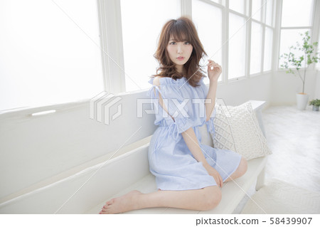 Curly hair medium style Japanese women 58439907