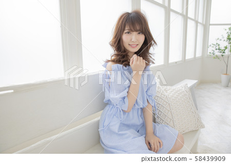 Curly hair medium style Japanese women 58439909