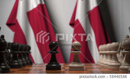Flags of Denmark behind pawns on the chessboard. Chess game or political rivalry related 3D Flags of Denmark behind pawns on the chessboard. Chess game or political rivalry related 3D 58440586