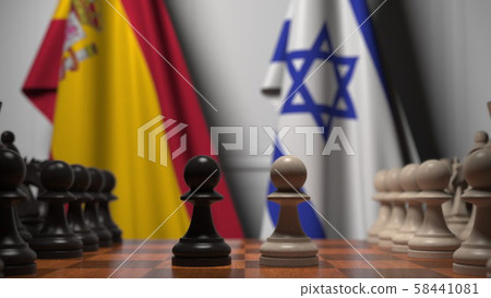 Flags of Spain and Israel behind pawns on the chessboard. Chess game or political rivalry related 3D Flags of Spain and Israel behind pawns on the chessboard. Chess game or political rivalry related 3D 58441081