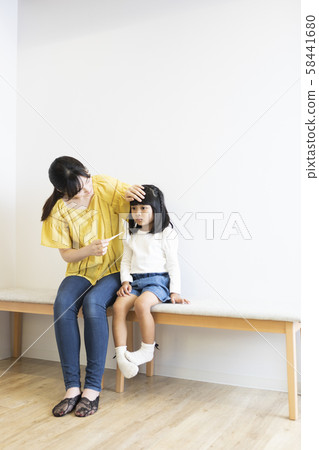 Girl catching a cold 58441680