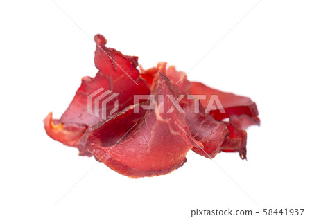 Pork jerky isolated on white background. Pieces of dry meat. Close-up. Clipping path. 58441937