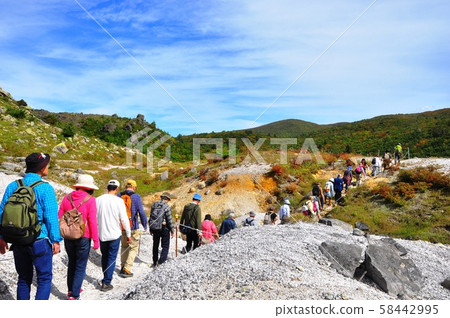 Kurikoma National Monument, Kurikoma Mountain Trail, a group hiker walking near the beach of Sagami Kurikoma National Monument, Kurikoma Mountain Trail, a group hiker walking near the beach of Sagami 58442995