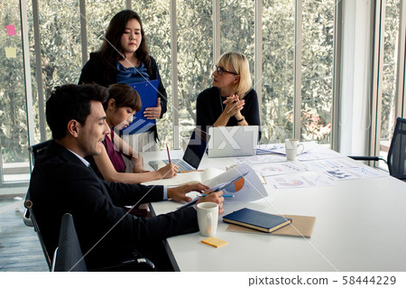 Businessmen talk to negotiate the work of the 58444229