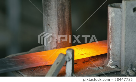 Forge workshop on table. Smithy manual production. Work on the product. Ruler, angle grinder. The 58447785