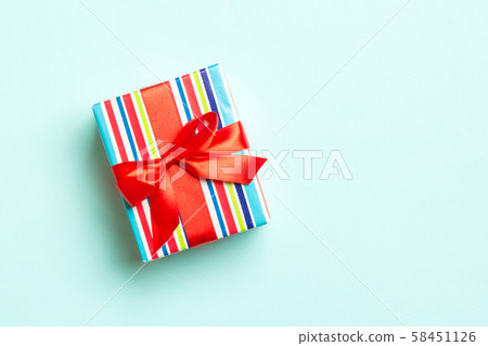 Gift box with red bow for Christmas or New Year Gift box with red bow for Christmas or New Year 58451126