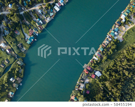 Floating restaurants and guesthouses located on the river bank Floating restaurants and guesthouses located on the river bank 58455194