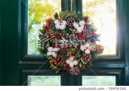 Christmas wreath on the house door Christmas wreath on the house door 58456166