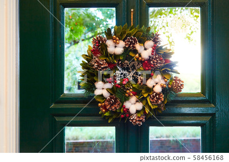 Christmas wreath on the house door Christmas wreath on the house door 58456168