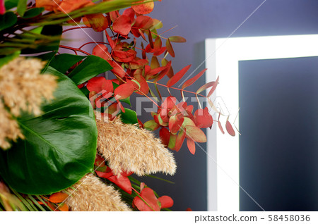 Floral decor.Composition of pampas grass with palm leaves. Floral decor.Composition of pampas grass with palm leaves. 58458036
