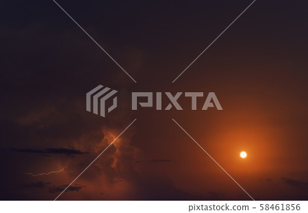 Cloudy sky with full moon and lighting Cloudy sky with full moon and lighting 58461856